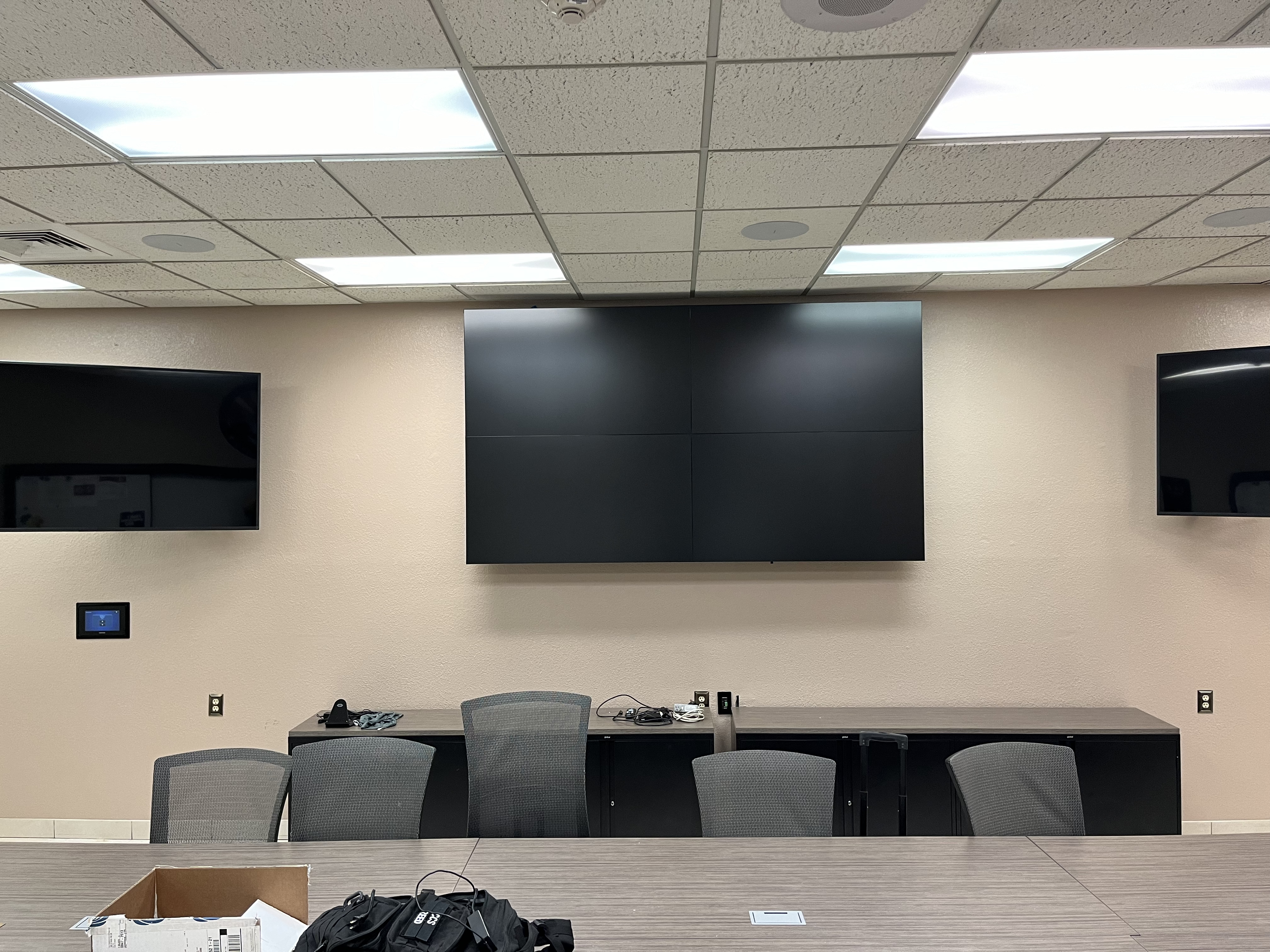 Large mounted display installation demonstrating precise alignment and careful execution