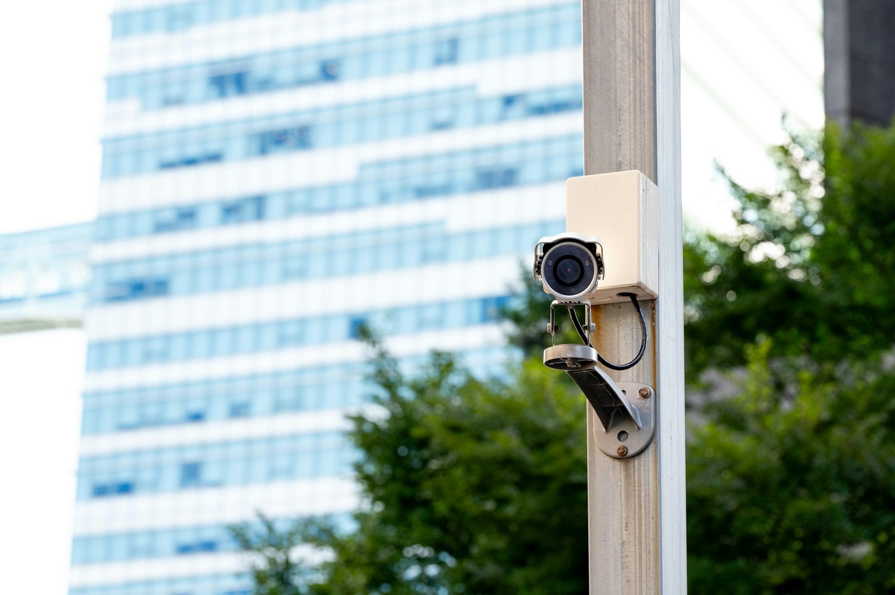 Security camera mounted on a building