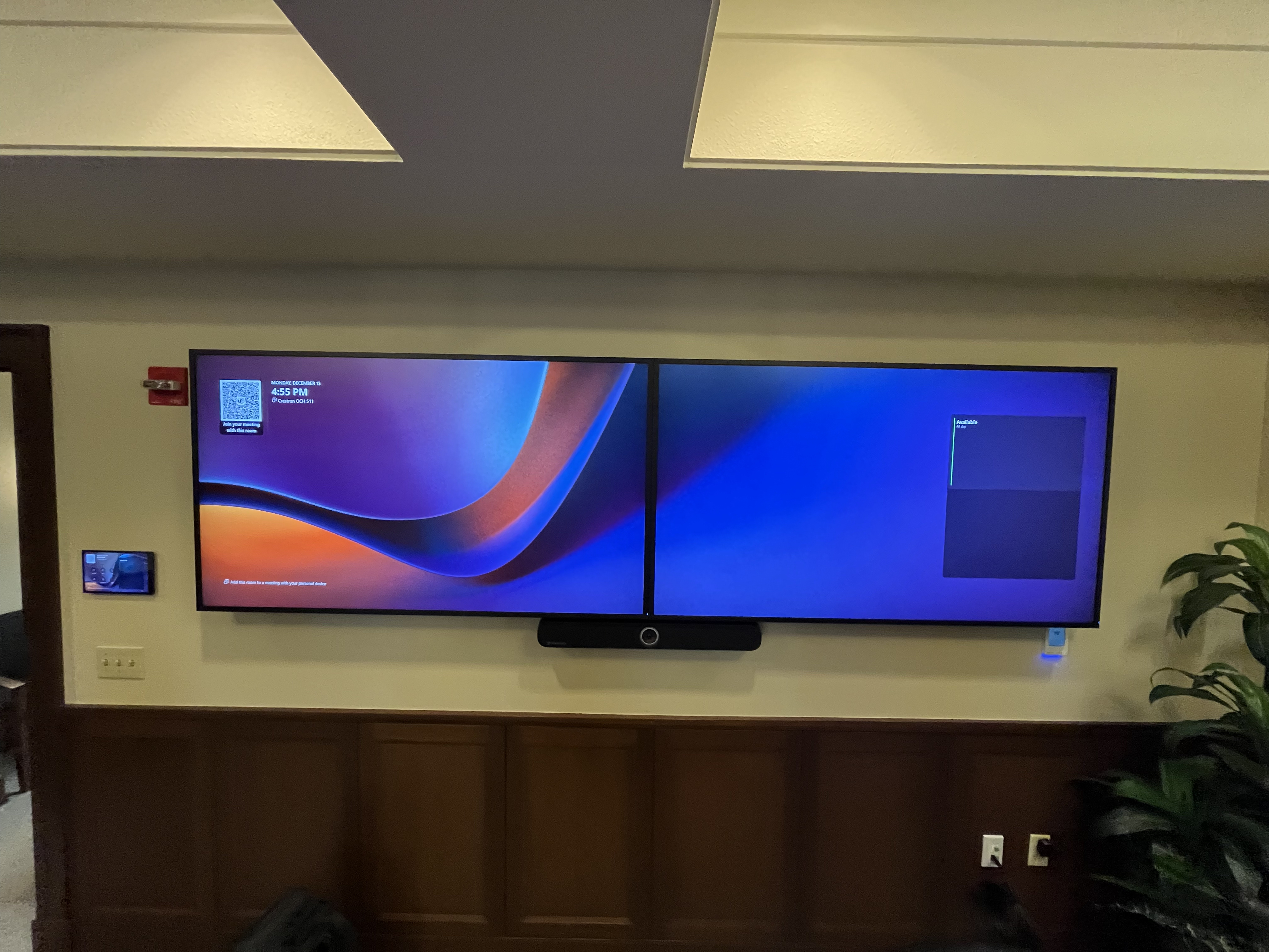 Dual-display and soundbar setup installed cleanly for a polished residential multi-use space