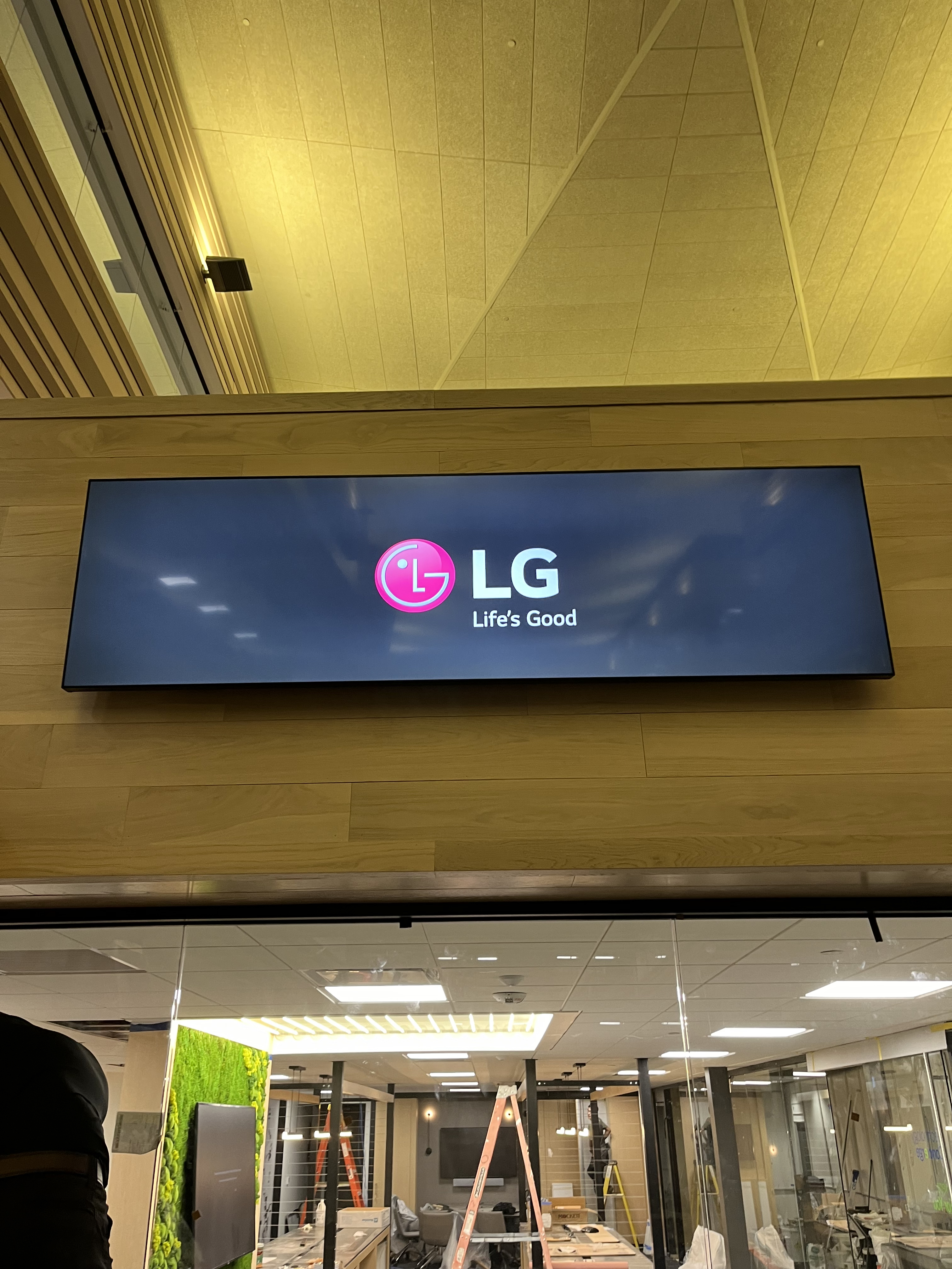 Commercial digital signage display mounted cleanly for high-visibility business presentation